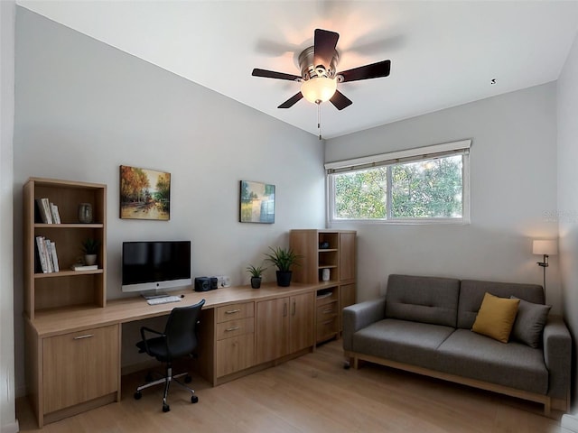 2631 Mcdonald Ter, Mount Dora, FL 32757 - home office featuring a ceiling fan, built in desk, and light wood-type flooring