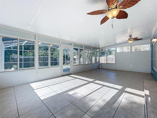 2631 Mcdonald Ter, Mount Dora, FL 32757 - unfurnished sunroom with tile patterned floors and lofted ceiling
