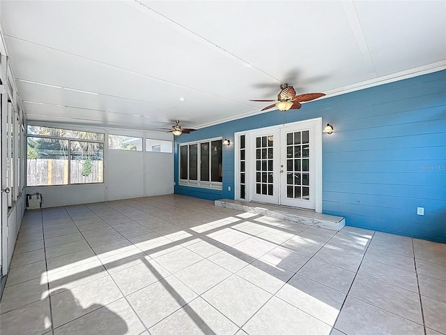 2631 Mcdonald Ter, Mount Dora, FL 32757 - unfurnished sunroom featuring french doors and a ceiling fan