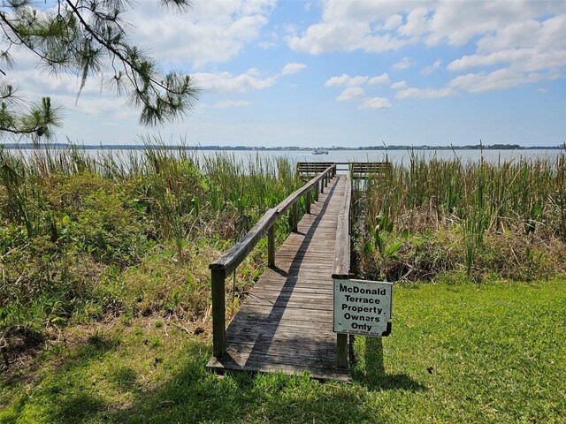 2631 Mcdonald Ter, Mount Dora, FL 32757 - view of dock with a water view
