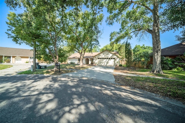 view of front facade featuring an attached garage and driveway
