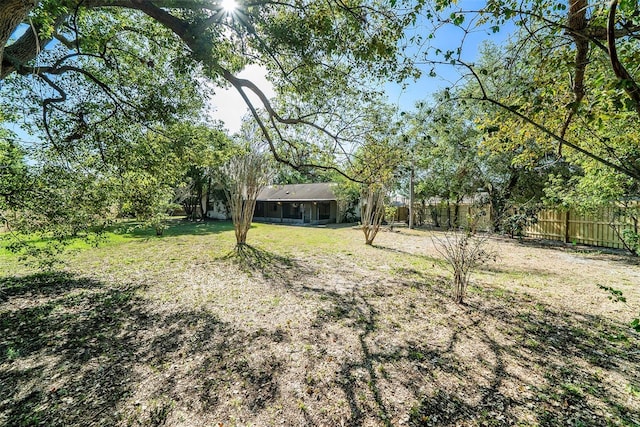 view of yard with fence