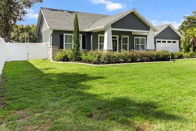 8717 SE 156th St, Summerfield, FL 34491 - view of front of house with board and batten siding, a shingled roof, and an attached garage