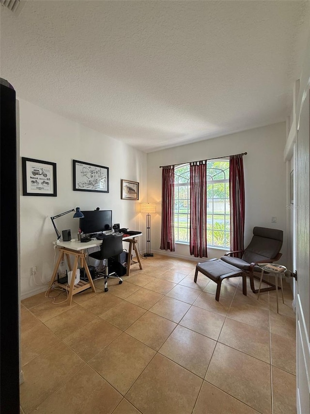 4920 E Lake Cove Blvd, Saint Cloud, FL 34771 - office area featuring light tile patterned floors and a textured ceiling