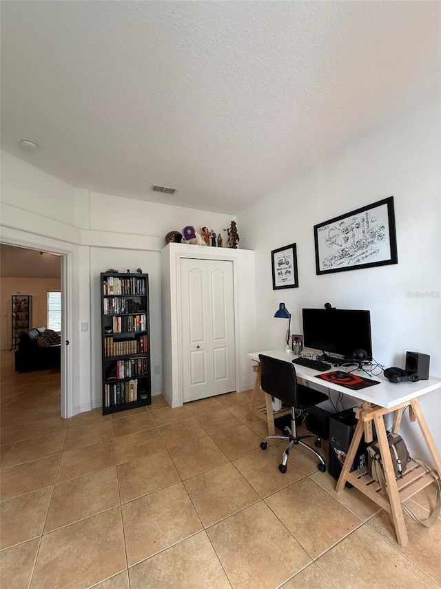 4920 E Lake Cove Blvd, Saint Cloud, FL 34771 - office area featuring light tile patterned floors and a textured ceiling