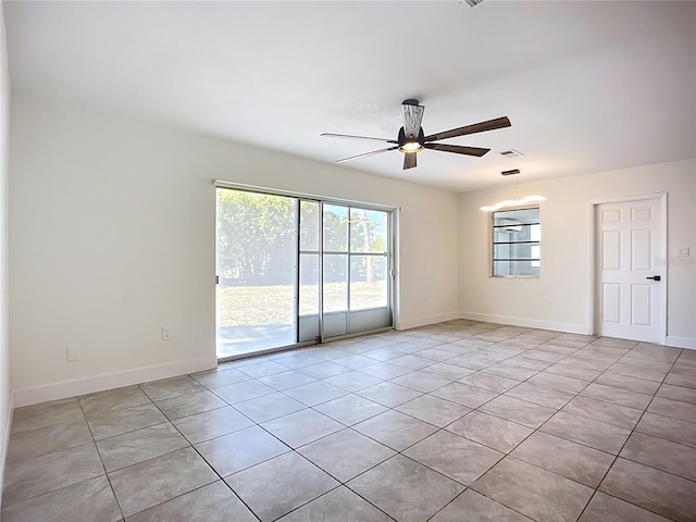 22131 Bahama Ave, Port Charlotte, FL 33952 - spare room with a ceiling fan, baseboards, visible vents, and light tile patterned floors