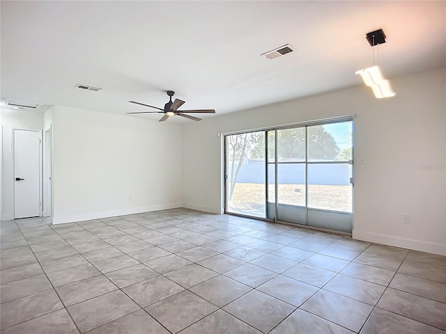 22131 Bahama Ave, Port Charlotte, FL 33952 - empty room featuring a ceiling fan, visible vents, and light tile patterned floors