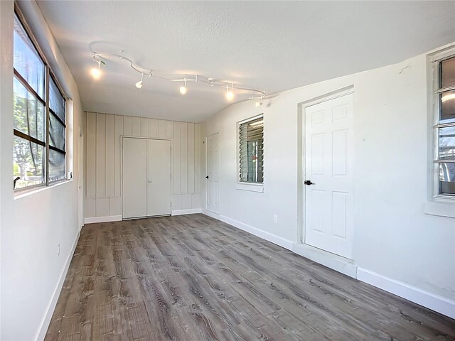 22131 Bahama Ave, Port Charlotte, FL 33952 - empty room featuring baseboards and wood finished floors