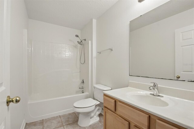 full bathroom featuring toilet, shower / tub combination, tile patterned flooring, and vanity
