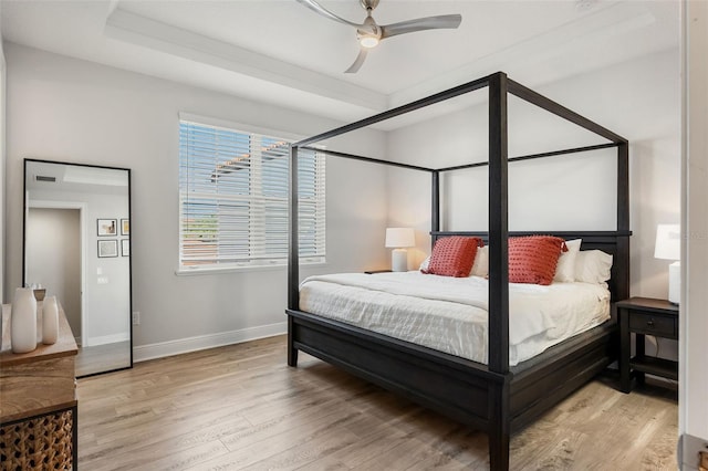 8848 Bismarck Palm Dr, Winter Garden, FL 34787 - bedroom featuring baseboards, ceiling fan, and light wood-type flooring
