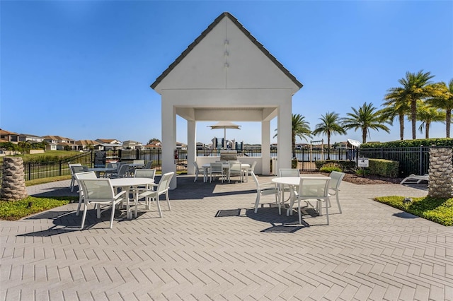 8848 Bismarck Palm Dr, Winter Garden, FL 34787 - view of patio / terrace with a gazebo, fence, and outdoor dining space