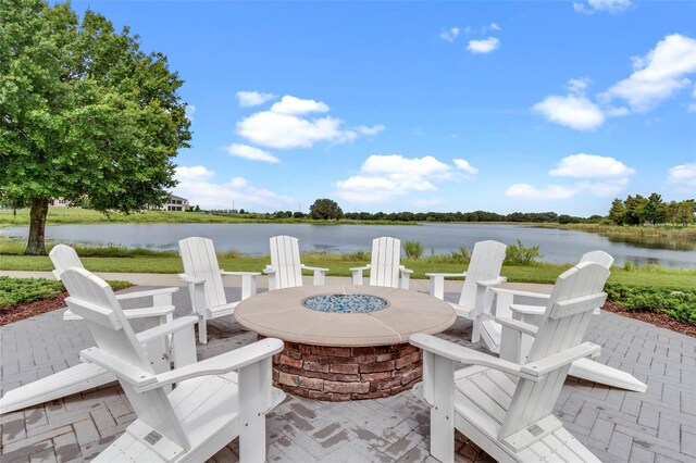 8848 Bismarck Palm Dr, Winter Garden, FL 34787 - view of patio featuring a water view and a fire pit