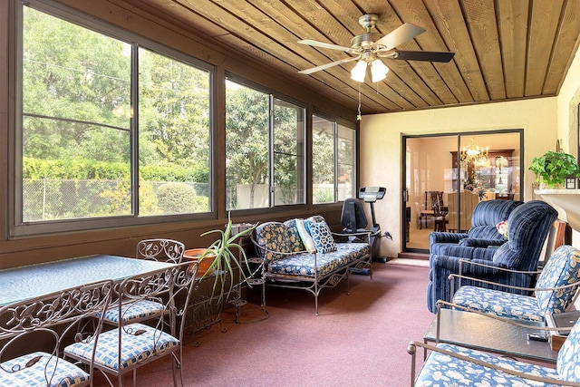 sunroom with ceiling fan