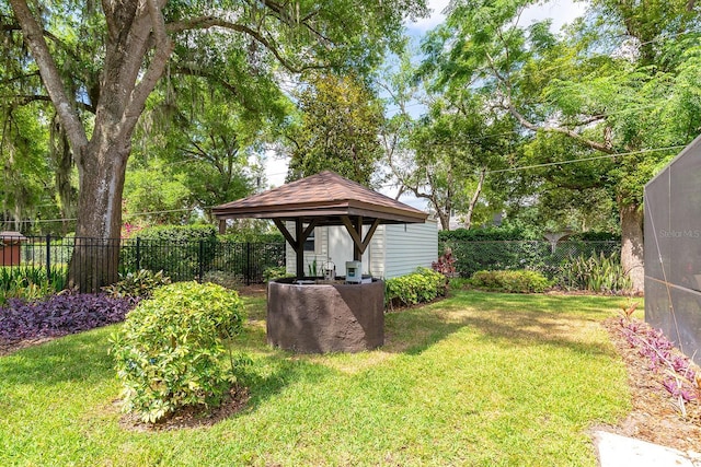 view of yard with a gazebo and a fenced backyard