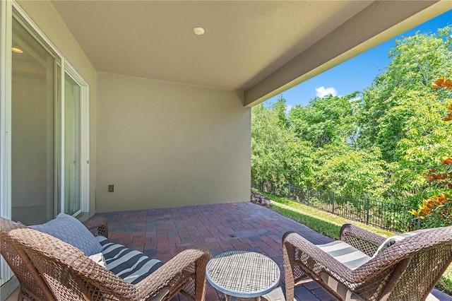 2127 Bay Line Rd, Oakland, FL 34787 - view of patio featuring fence and view of scattered trees