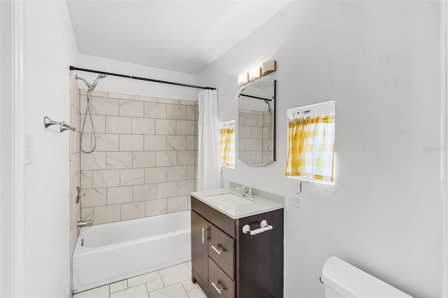 bathroom with vanity, marble finish floor, shower / bath combo, and toilet