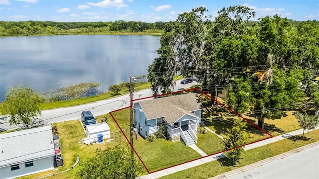 drone / aerial view with a water view