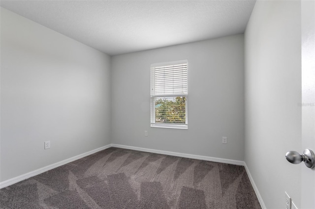 5118 Adelaide Dr, Kissimmee, FL 34746 - spare room featuring baseboards and carpet