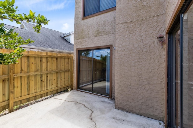view of patio / terrace with fence