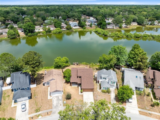 aerial view with a water view and a residential view
