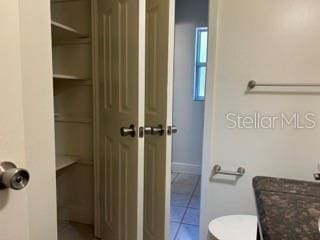 bathroom featuring tile patterned floors