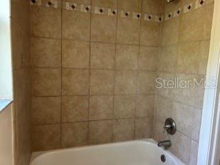full bathroom featuring tub / shower combination