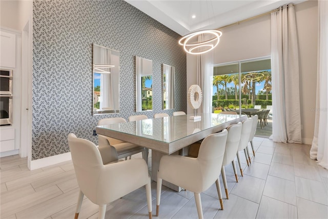 7905 Jacks Club Dr, Kissimmee, FL 34747 - dining area with wallpapered walls, a chandelier, and recessed lighting