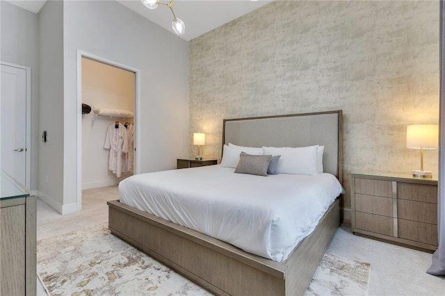 7905 Jacks Club Dr, Kissimmee, FL 34747 - carpeted bedroom featuring a spacious closet and baseboards