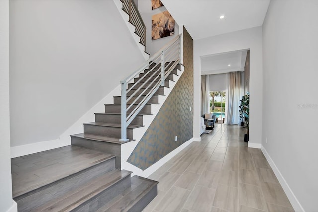 7905 Jacks Club Dr, Kissimmee, FL 34747 - stairs with baseboards and recessed lighting