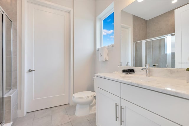 7905 Jacks Club Dr, Kissimmee, FL 34747 - bathroom with a stall shower, tile patterned floors, toilet, vanity, and recessed lighting