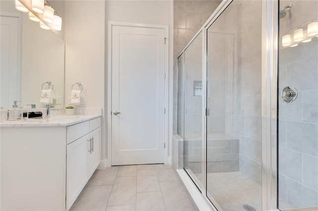 7905 Jacks Club Dr, Kissimmee, FL 34747 - full bath featuring a shower stall, tile patterned floors, and vanity