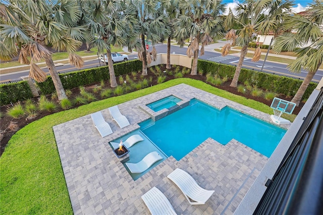 7905 Jacks Club Dr, Kissimmee, FL 34747 - view of swimming pool featuring a patio area and a pool with connected hot tub