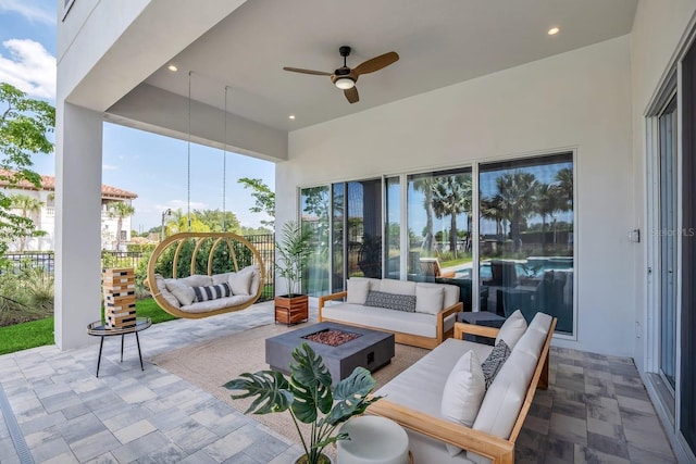 7905 Jacks Club Dr, Kissimmee, FL 34747 - view of patio / terrace with an outdoor living space with a fire pit and a ceiling fan