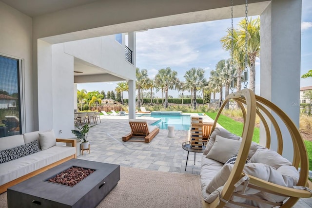 7905 Jacks Club Dr, Kissimmee, FL 34747 - outdoor pool featuring an outdoor living space with a fire pit and a patio area