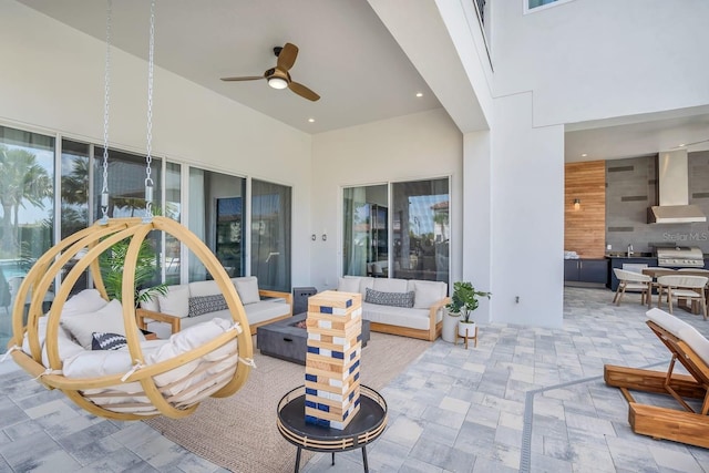 7905 Jacks Club Dr, Kissimmee, FL 34747 - view of patio / terrace featuring an outdoor living space with a fire pit, a ceiling fan, and area for grilling