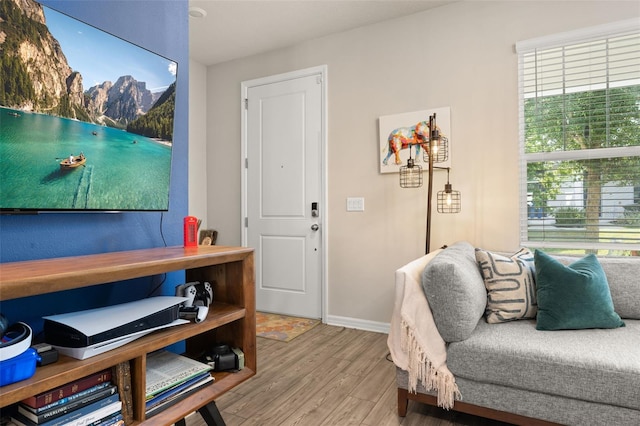 office area with wood finished floors and baseboards