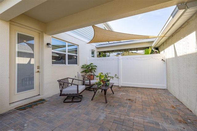 view of patio / terrace with fence