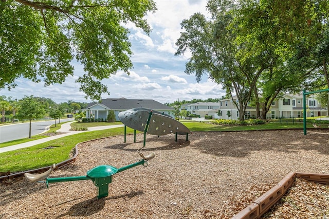 view of jungle gym with a residential view