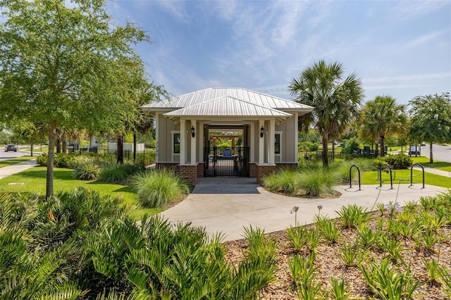 view of property's community with a gate