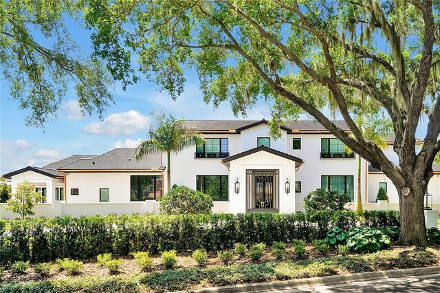 5525 Isleworth Country Club Dr, Windermere, FL 34786 - modern inspired farmhouse with stucco siding