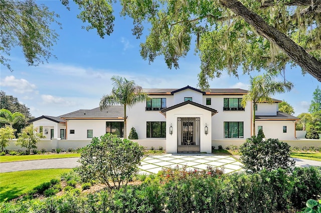 5525 Isleworth Country Club Dr, Windermere, FL 34786 - view of front facade with stucco siding