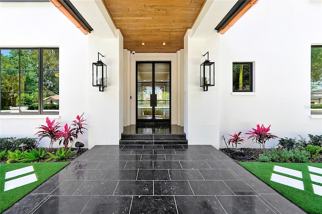 5525 Isleworth Country Club Dr, Windermere, FL 34786 - property entrance with stucco siding and a porch