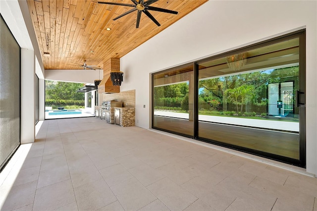 5525 Isleworth Country Club Dr, Windermere, FL 34786 - unfurnished living room featuring wood ceiling, ceiling fan, a fireplace, and a towering ceiling