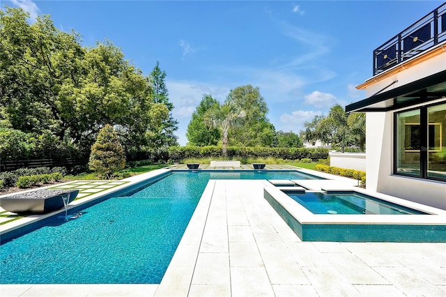 5525 Isleworth Country Club Dr, Windermere, FL 34786 - view of swimming pool with view of scattered trees, a pool with connected hot tub, and a patio