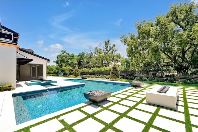 5525 Isleworth Country Club Dr, Windermere, FL 34786 - view of pool featuring a patio, fence, view of scattered trees, and a pool with connected hot tub