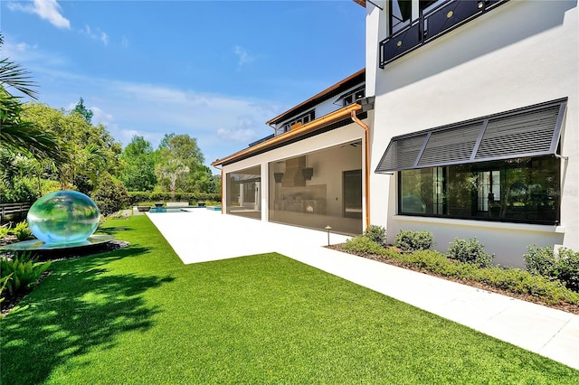 5525 Isleworth Country Club Dr, Windermere, FL 34786 - view of green lawn featuring a swimming pool and a patio