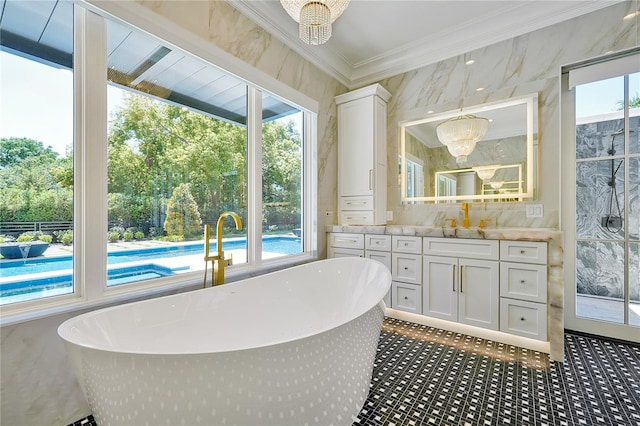 5525 Isleworth Country Club Dr, Windermere, FL 34786 - bathroom featuring plenty of natural light, crown molding, vanity, a chandelier, and a freestanding tub
