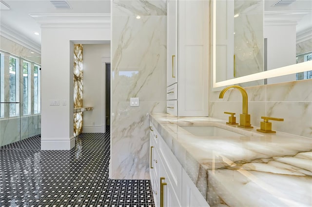 5525 Isleworth Country Club Dr, Windermere, FL 34786 - full bath featuring ornamental molding, vanity, a marble finish shower, and tile walls