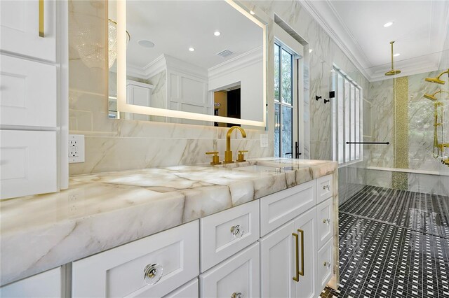 5525 Isleworth Country Club Dr, Windermere, FL 34786 - bathroom with crown molding, a marble finish shower, double vanity, tasteful backsplash, and recessed lighting