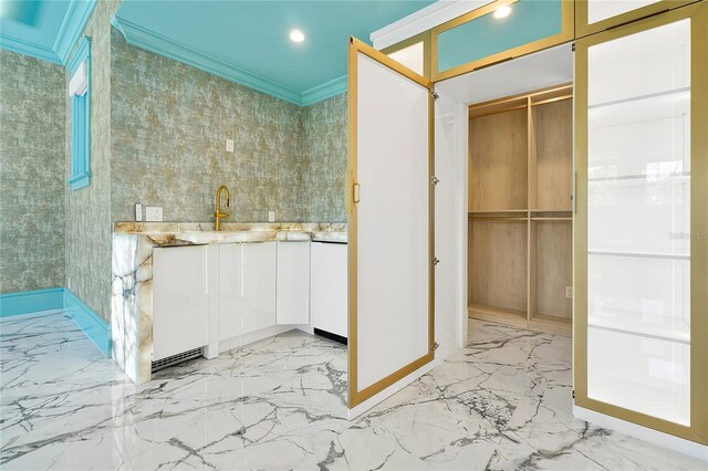 5525 Isleworth Country Club Dr, Windermere, FL 34786 - bathroom with marble tiled flooring, crown molding, recessed lighting, baseboards, and vanity